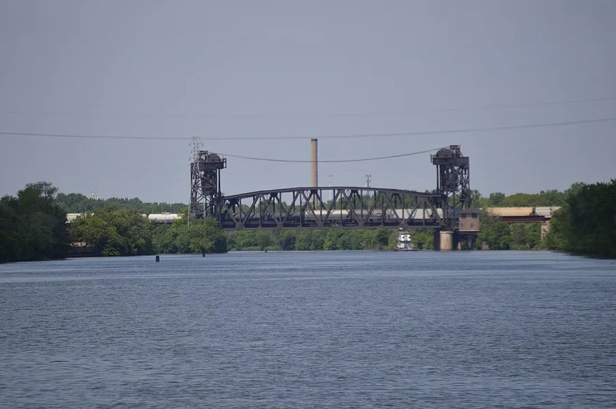 CN Des Plaines River Bridge with train crossing - telephoto view from south (2015) in Joliet, Illinois